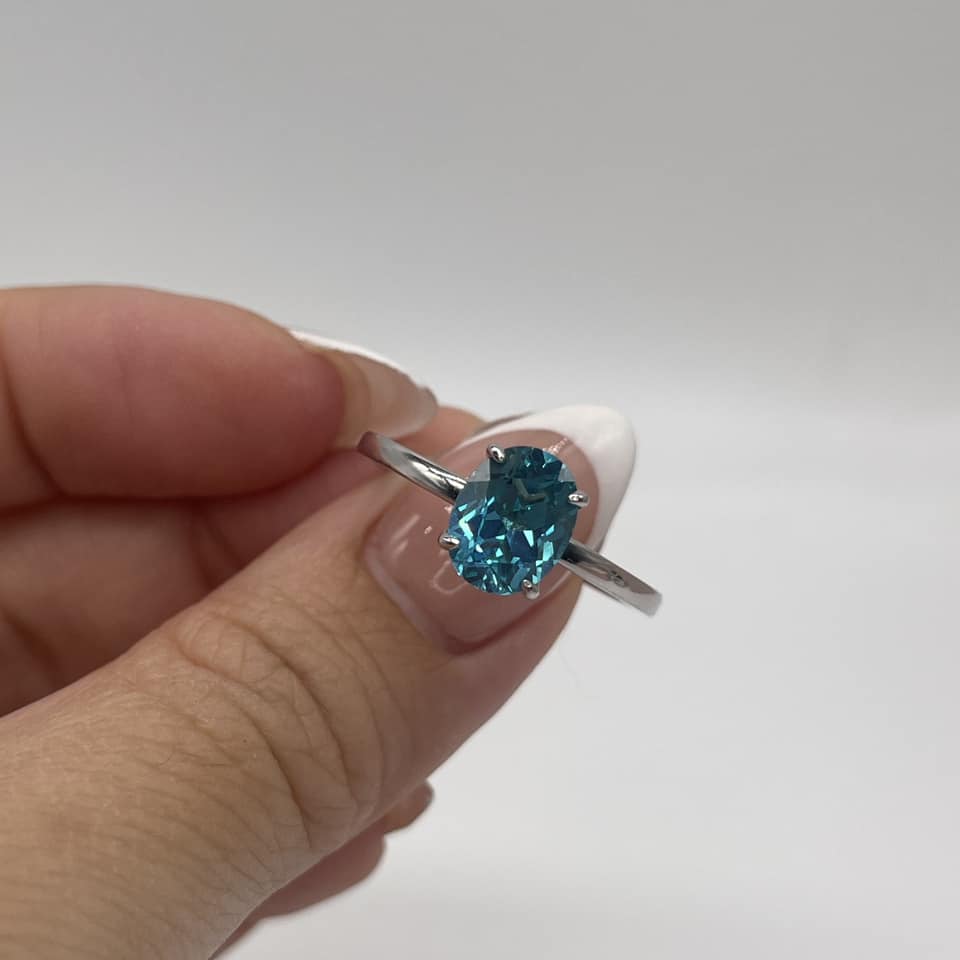 Solitaire Blue Topaz Ring