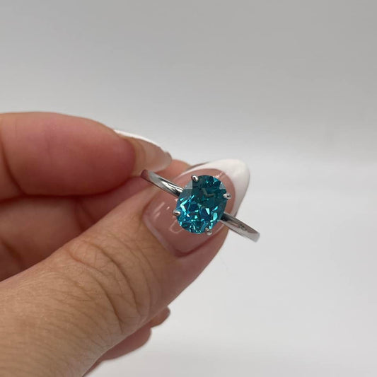 Solitaire Blue Topaz Ring